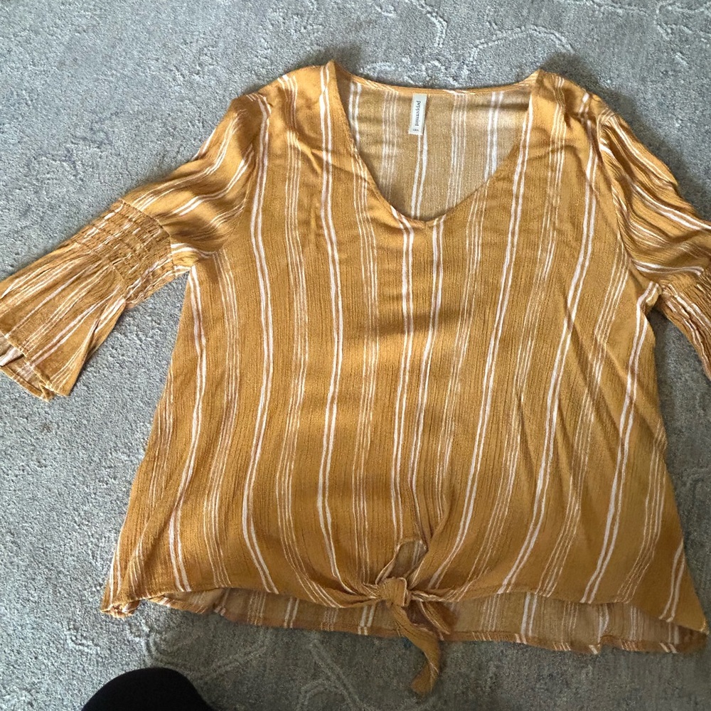 Gold and off white blouse. Tie waist. Gathering detail on sleeves.